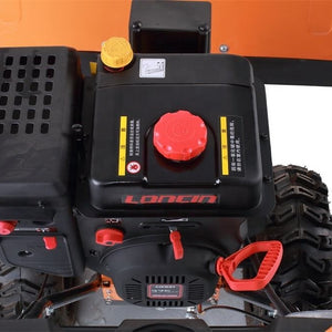 Gas snow sweeper engine and fuel tank close-up